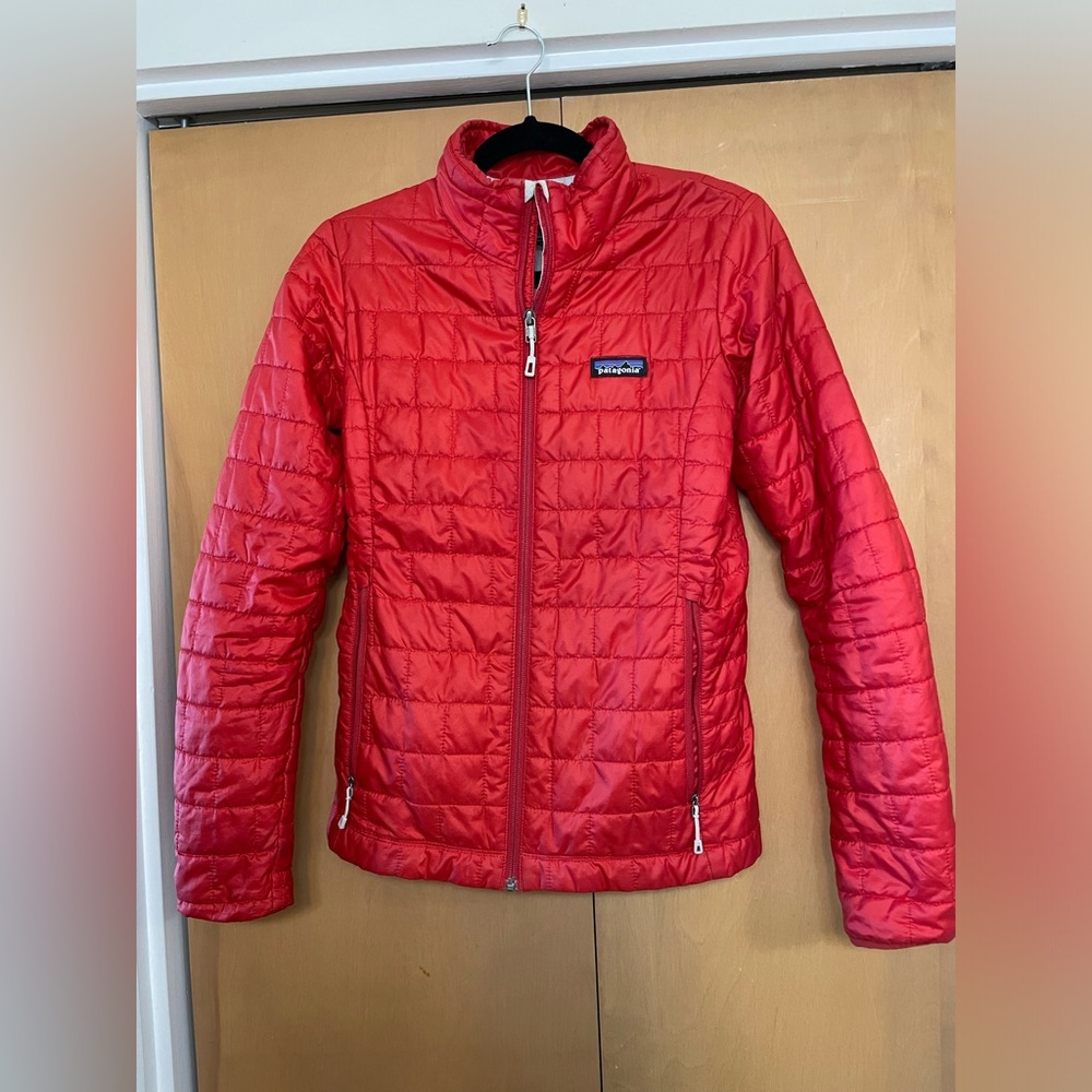 Patagonia women’s red nano puff jacket.  Size small.  Lightly used